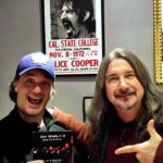 Matthew presenting good friend (and ICRT DJ) Terry Engel with a DVD from another good friend, Mike Keneally.