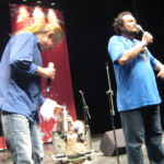 Ethan bringing Matthew water, as our friend Hsieh Yu-wei soundchecks for the show.